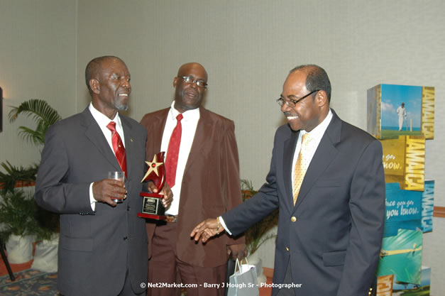 Red Cap Porters Awards - Minister of Tourism, Hon. Edmund Bartlett - Director of Tourism, Basil Smith - Friday, December 14, 2007 - Holiday Inn Sunspree, Montego Bay, Jamaica W.I. - Photographs by Net2Market.com - Barry J. Hough Sr, Photographer - Negril Travel Guide, Negril Jamaica WI - http://www.negriltravelguide.com - info@negriltravelguide.com...!