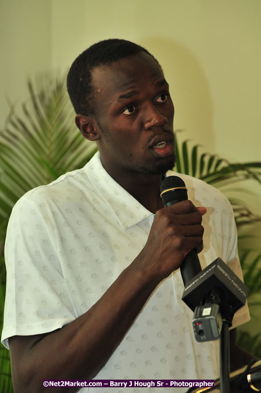 Usain Bolt of Jamaica - The Fastest Man In The World  - Usain Bolt Homecoming Celebrations - Press Conference at the Grand Bahia Principe &amp; Sherwood Content - Waldensia Primary School - Photographs by Net2Market.com - Barry J. Hough Sr. Photojournalist/Photograper - Photographs taken with a Nikon D300 - Negril Travel Guide, Negril Jamaica WI - http://www.negriltravelguide.com - info@negriltravelguide.com...!